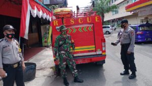 Polsek Batu Ampar dan Tim Gugus Covid-19,  Semprotran Disinfektan dan Adaptasi Kebiasaan Baru di Kampung Bule